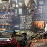 A firefighter disinfects a traditional shopping center to help prevent the spread of the new coronavirus in northern Tehran, Iran, on March, 6, 2020.