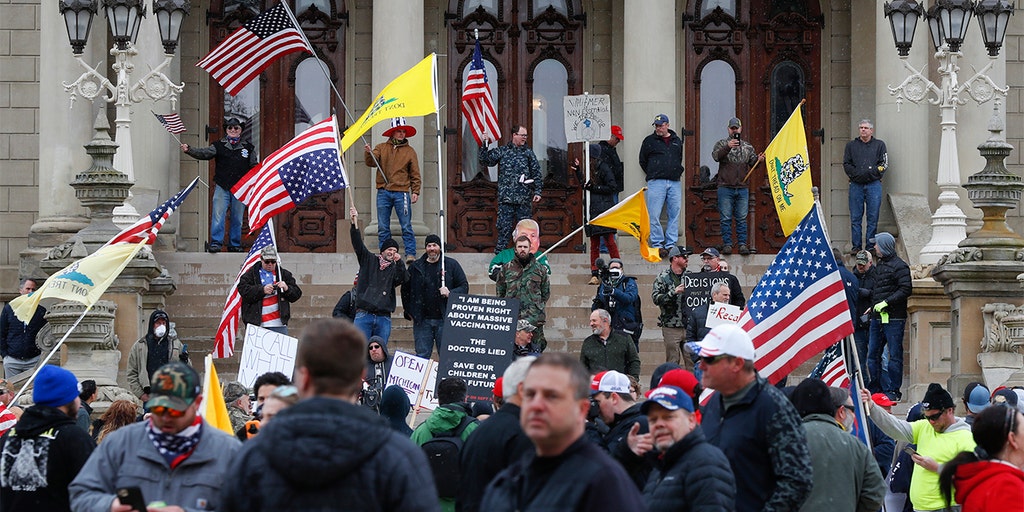 Michigan bans open carry of guns inside state
Capitol