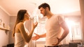 Side view young couple having an  argument at home