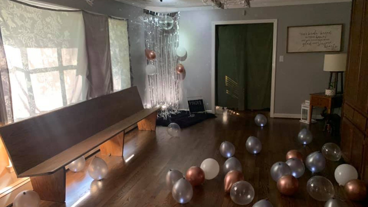 Zoe's mom Brandy and her family decorated the dining room with lights, balloons, streamers, and a disco ball they borrowed from the dress shop.
