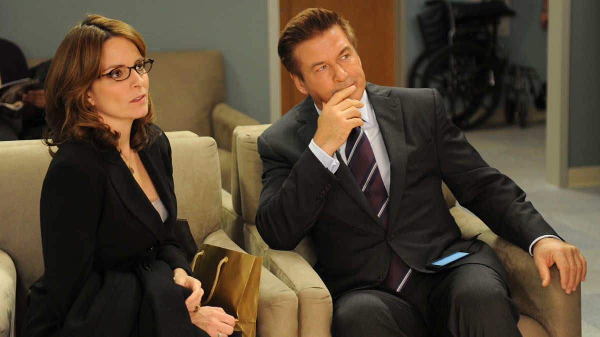 Tina Fey as Liz Lemon and Alec Baldwin as Jack Donaghy in '30 Rock.' (Photo by: Ali Goldstein/NBCU Photo Bank/NBCUniversal via Getty Images via Getty Images)
