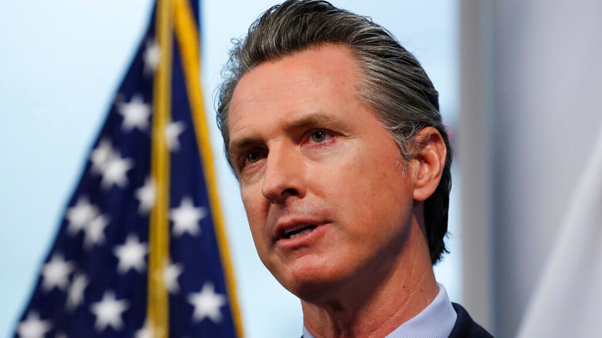 California Gov. Gavin Newsom speaking at a news briefing at the Governor's Office of Emergency Services in Rancho Cordova, Calif. earlier this month. 
