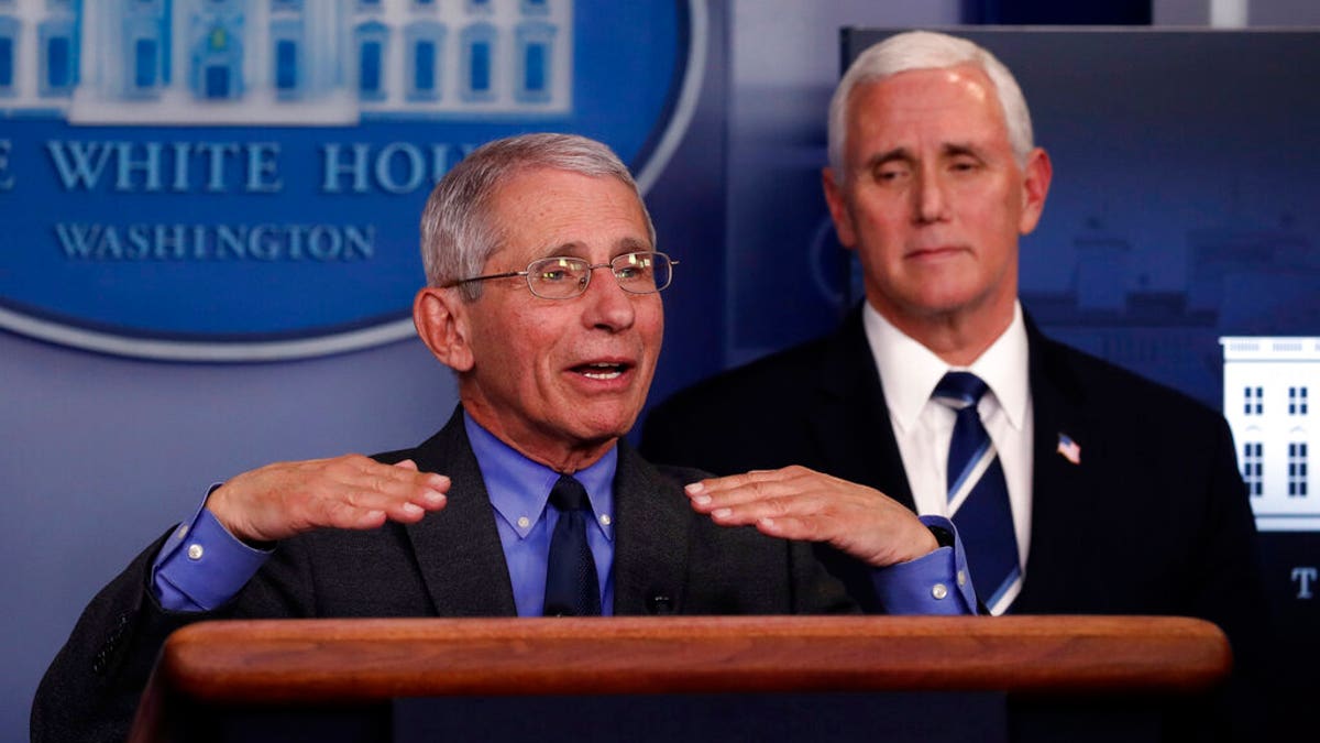 Dr. Anthony Fauci, director of the National Institute of Allergy and Infectious Diseases, speaks about the coronavirus in the James Brady Press Briefing Room of the White House, Tuesday, April 7, 2020, in Washington, as Vice President Mike Pence listens. (AP Photo/Alex Brandon)