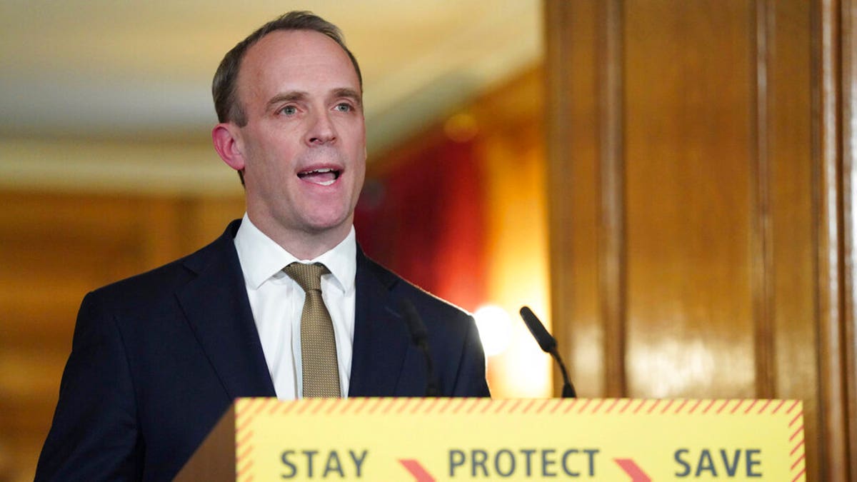 Britain's Foreign Secretary Dominic Raab answers questions from the media via a video link during a media briefing on coronavirus in Downing Street, London, Monday, March 30, 2020. 