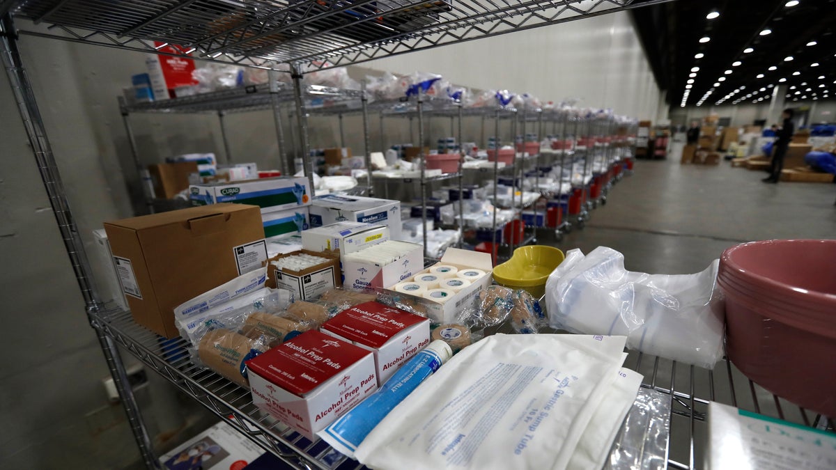 Closeup of a medical supply shelf at the TCF Center, Monday, April 6, 2020, in Detroit. The city's convention center was converted to accommodate an overflow of patients with the coronavirus. More than 2,200 employees at two major health systems in Michigan have either tested positive for the novel coronavirus or have symptoms, according to multiple reports on Monday. (AP Photo/Carlos Osorio)