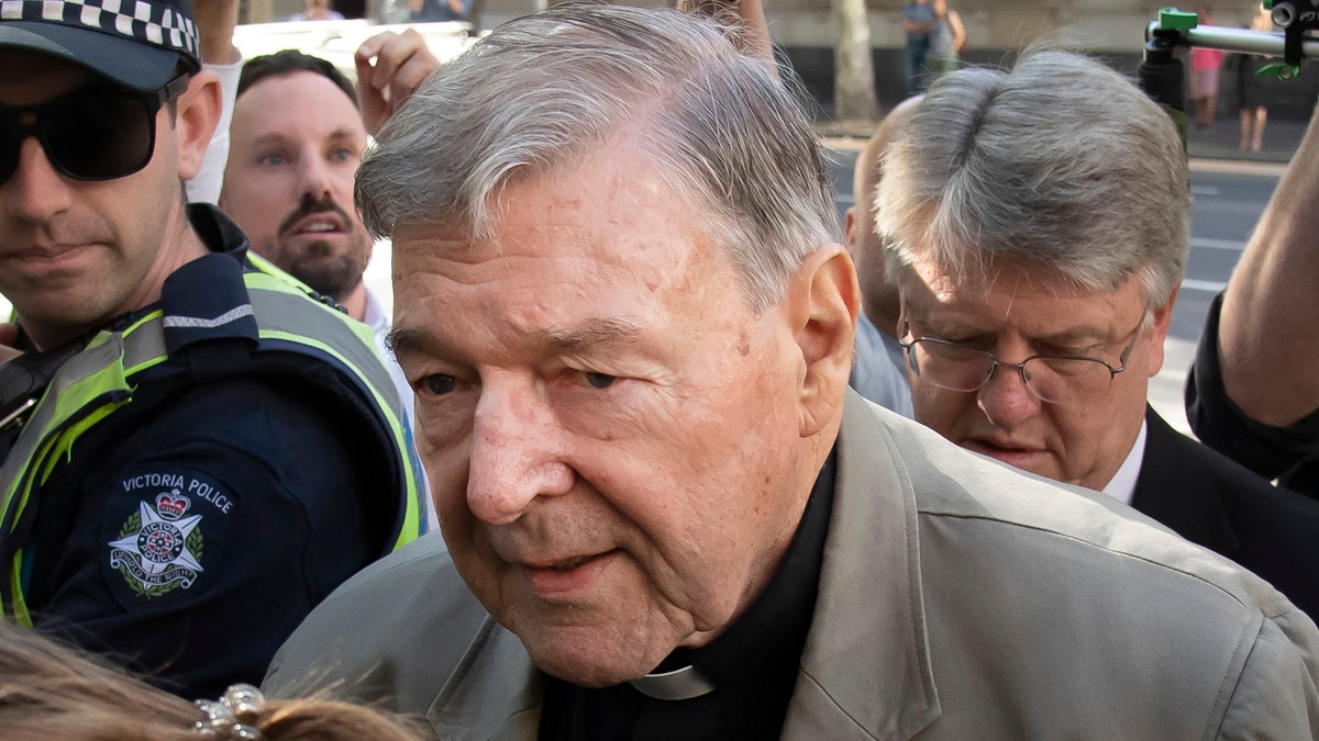 Cardinal George Pell arrives at the County Court in Melbourne, Australia in February. Australia's highest court on Tuesday, April 7, 2020, has dismissed the convictions of the most senior Catholic found guilty of child sex abuse. (AP Photo/Andy Brownbill, File)