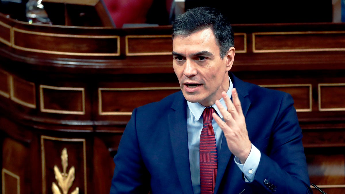 Spain’s Prime Minister, Pedro Sanchez speaks at a parliamentary session in Madrid, Spain, Thursday. Sanchez acknowledged that Spain’s government, and its regions which administer health services, were caught off guard by the crisis and left its hospitals woefully short on critical supplies, including virus tests and protective clothing for medical workers.(Mariscal, Pool photo via AP)