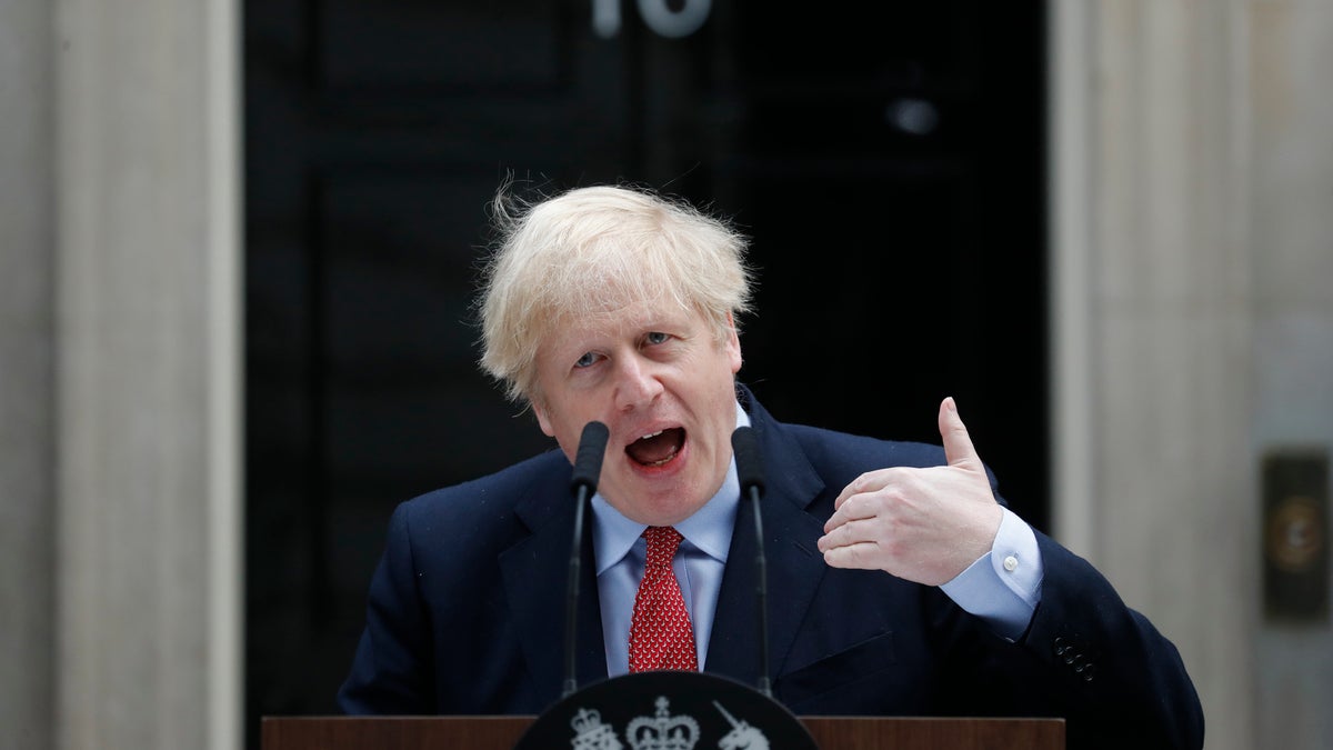 British Prime Minister Boris Johnson makes a statement on his first day back at work in Downing Street, London, on Monday after recovering from a bout with the coronavirus that put him in intensive care. (AP)