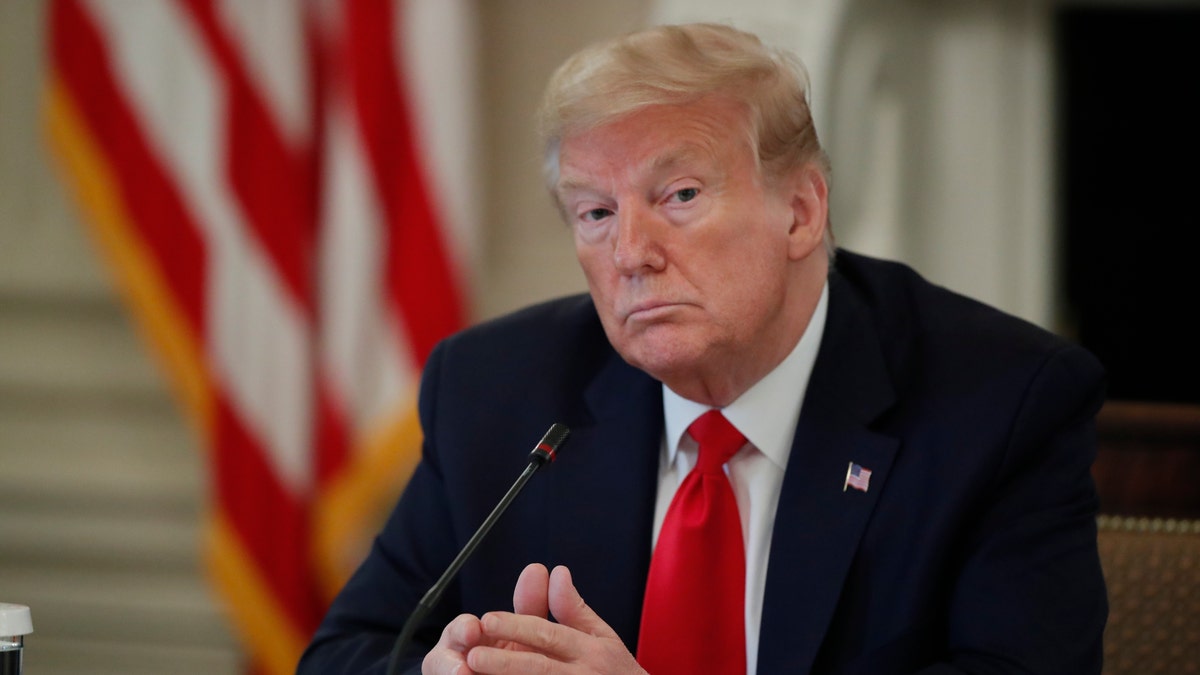 President Donald Trump speaks about reopening the country, during a roundtable with industry executives, in the State Dining Room of the White House April 29, in Washington. (AP Photo/Alex Brandon)