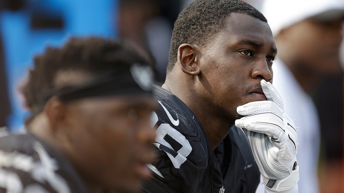 Then-Oakland Raiders linebacker Aldon Smith (99) sits on the bench during the second half of the team's NFL football game against the Cincinnati Bengals in Oakland, California, Sept. 13, 2015. (Associated Press)