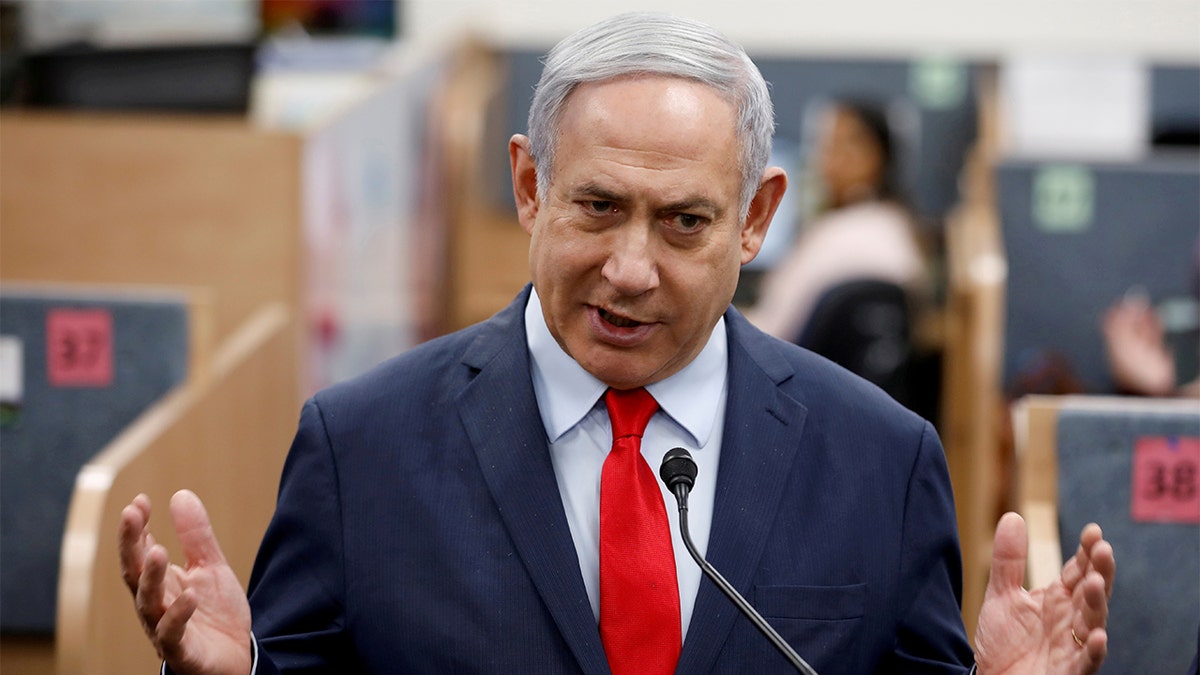 Israeli Prime Minister Benjamin Netanyahu gestures as he delivers a statement during his visit at the Health Ministry national hotline, in Kiryat Malachi, Israel last month. (REUTERS/Amir Cohen/File Photo)