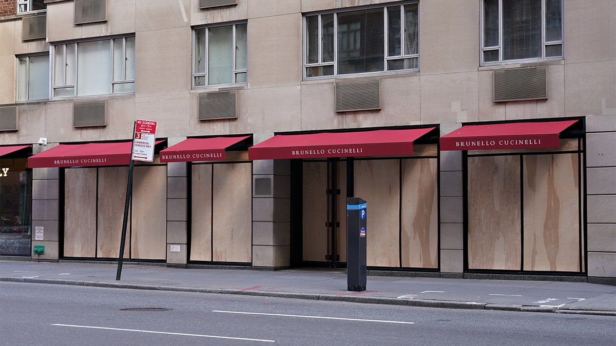 NEW YORK, NEW YORK - APRIL 02: Brunello Cuccinelli on Madison Ave is boarded up as the coronavirus continues to spread across the United States on April 02, 2020 in New York City. The coronavirus (COVID-19) pandemic has spread to at least 180 countries and territories across the world, claiming over 40,000 lives and infecting hundreds of thousands more.