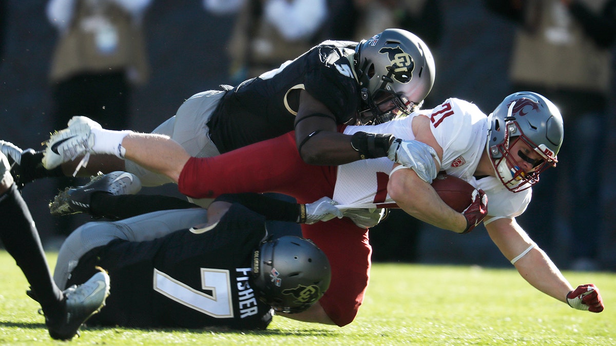 Colorado linebacker Davion Taylor went to the Eagles. (AP Photo/David Zalubowski, File)