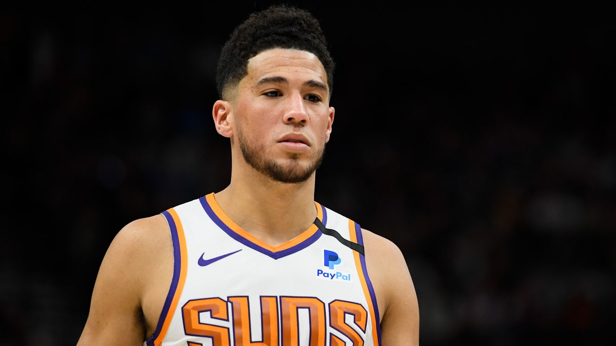 SALT LAKE CITY, UT - FEBRUARY 24: Devin Booker #1 of the Phoenix Suns looks on during a game against the Utah Jazz at Vivint Smart Home Arena on February 24, 2020 in Salt Lake City, Utah. NOTE TO USER: User expressly acknowledges and agrees that, by downloading and/or using this photograph, user is consenting to the terms and conditions of the Getty Images License Agreement. (Photo by Alex Goodlett/Getty Images)