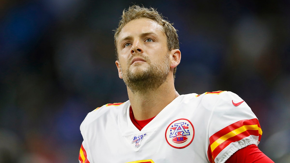 In this Sept. 29, 2019, file photo, Kansas City Chiefs punter Dustin Colquitt (2) watches during an NFL game against the Detroit Lions in Detroit. (AP Photo/Paul Sancya, Fle)