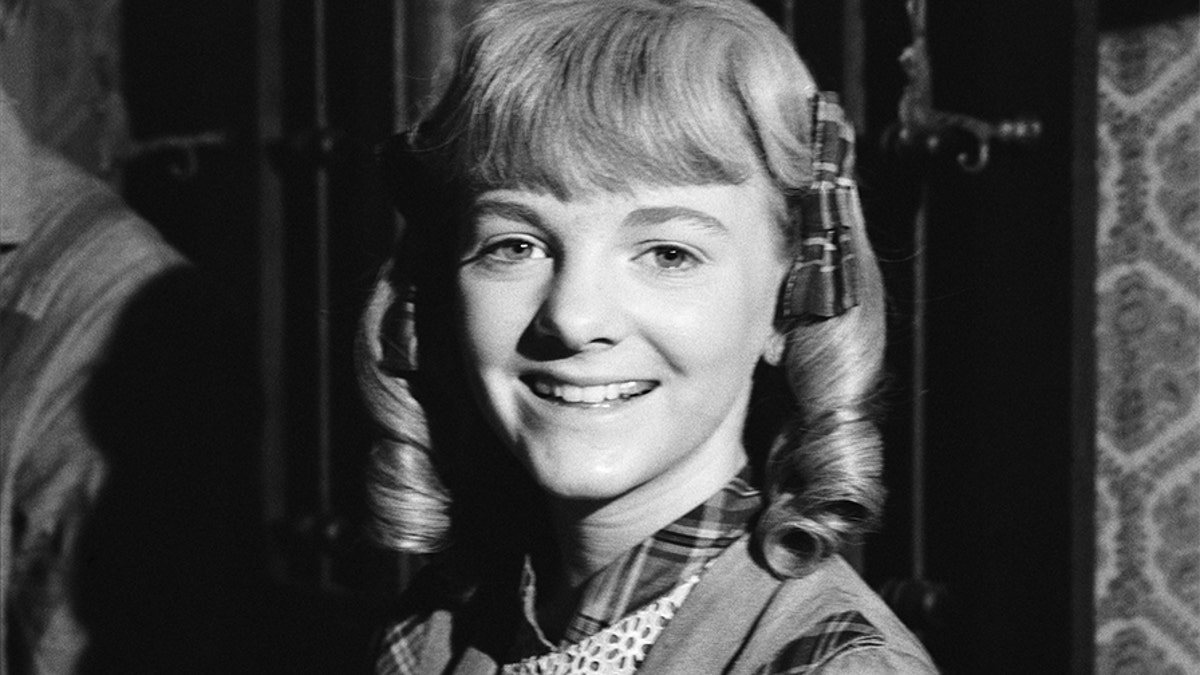 Alison Arngrim as Nellie Oleson.