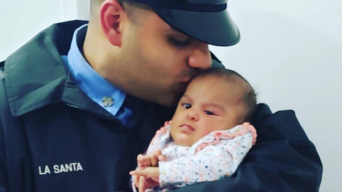 FDNY firefighter Jerel La Santa with his daughter Jay-Natalie.