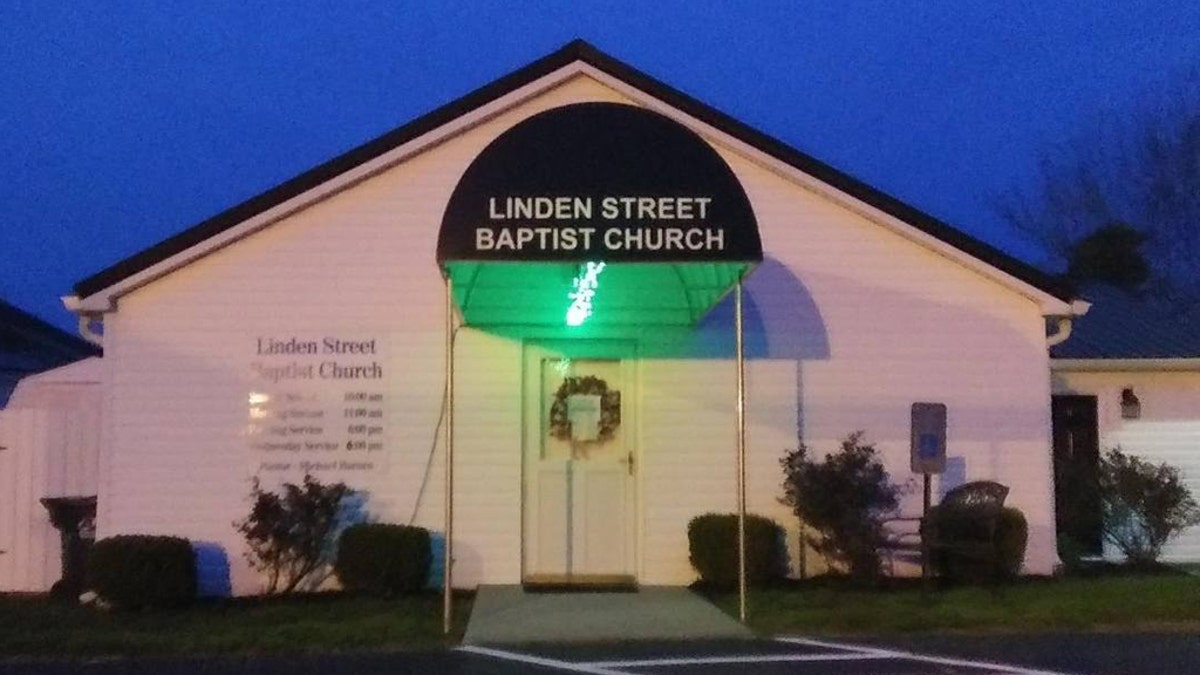 The Linden Street Baptist Church in Richmond, Kentucky is lit up green to show compassion amid the coronavirus pandemic.
