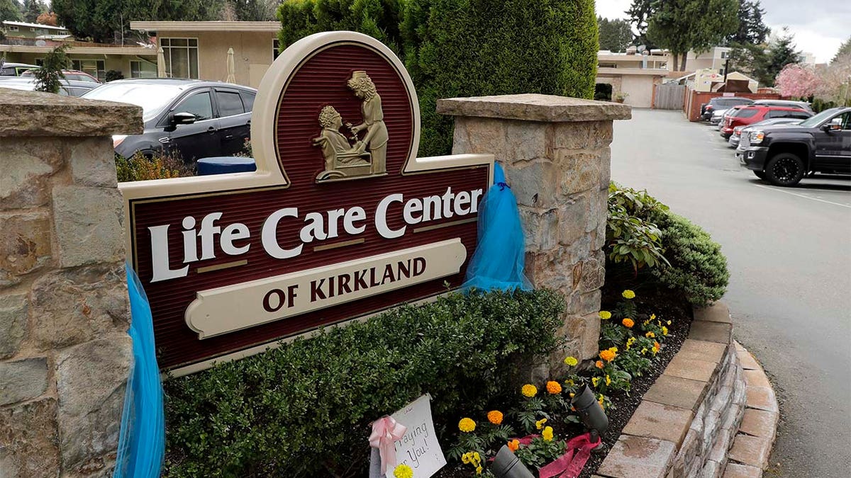 An entrance sign is shown Thursday, April 2, 2020, at the Life Care Center in Kirkland, Wash. Federal authorities on Wednesday, April 1, 2020, proposed a fine of more than $600,000 for the Seattle-area nursing home connected to at least 40 deaths from the new coronavirus. (AP Photo/Ted S. Warren)