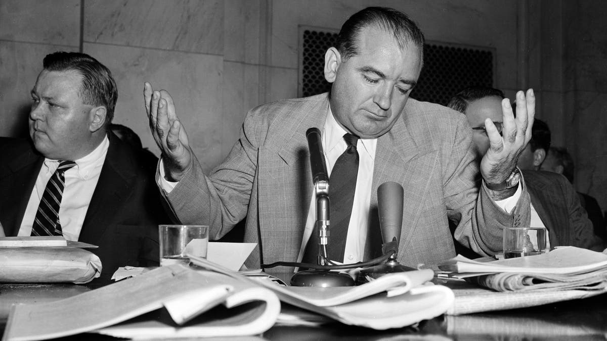Sen. Joseph McCarthy, R-Wis., gives a resigned shrug at being unable to get across with one of his "point of order" interruptions, during the Senate Investigation Subcommittee hearing, in Washington, D.C., April 30, 1954. Pvt. G. David Schine was in the witness chair at the time. (AP Photo/WF)
