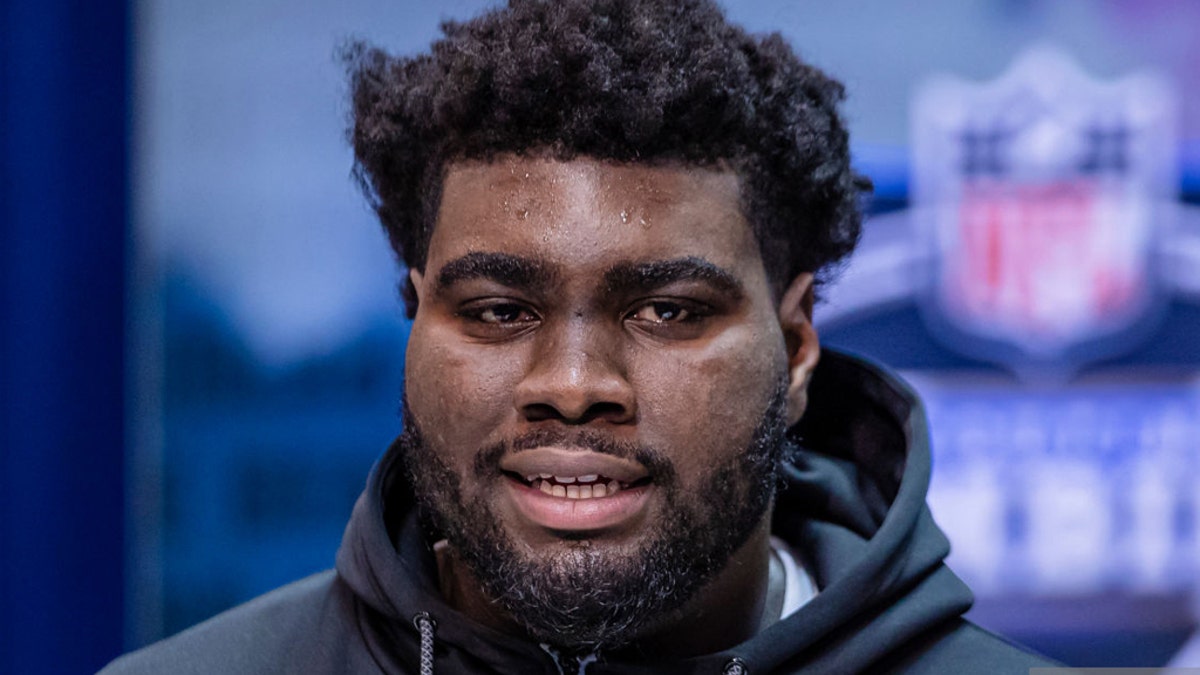 Mekhi Becton of the Louisville Cardinals speaks to the media at the Indiana Convention Center on February 26, 2020 in Indianapolis, Indiana. (Photo by Michael Hickey/Getty Images)