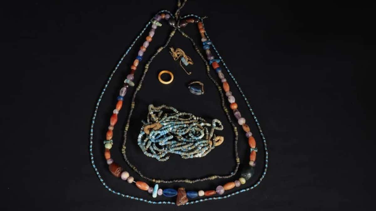 Necklaces were discovered with the mummy. (Egyptian Ministry of Tourism and Antiquities)