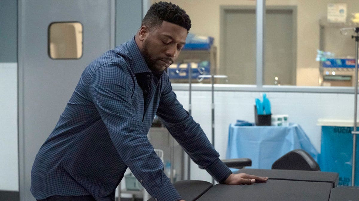 Pictured: Jocko Sims as Dr. Floyd Reynolds<br>