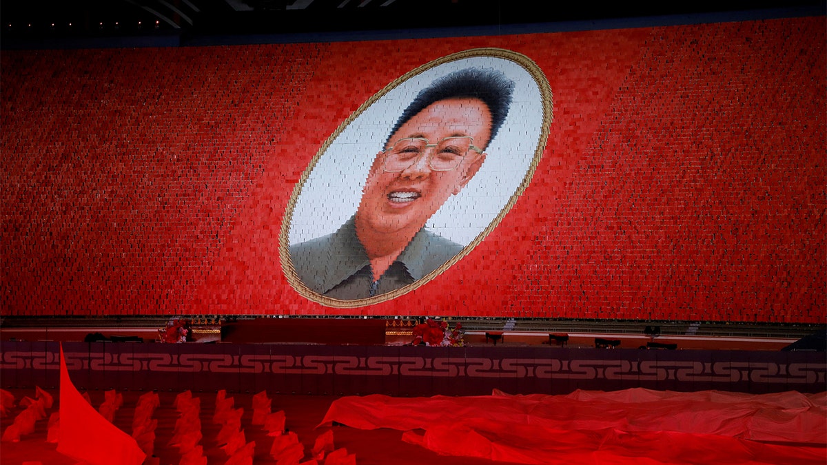 Participants form a portrait of Kim Jong Il during Mass Games in May Day stadium marking the 70th anniversary of North Korea's foundation in Pyongyang. (REUTERS/Danish Siddiqui)