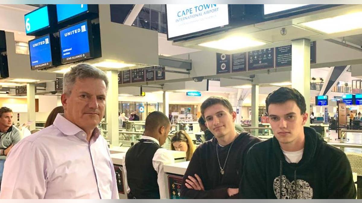 David Berman and his sons Jacob and Josh at the airport in Cape Town, South Africa. They had been on standby to leave on the last flight to New York before the country's coronavirus lockdown began.