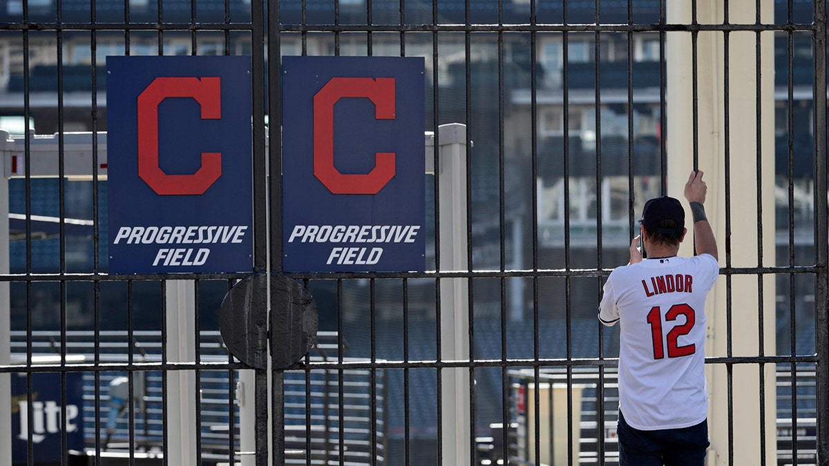 The Cleveland Indians' "C" logo -- which replaced the cartoonish "Chief Wahoo" two years ago -- is seen on gates at Progressive Field in Cleveland, March 26, 2020. (Associated Press)<br>
