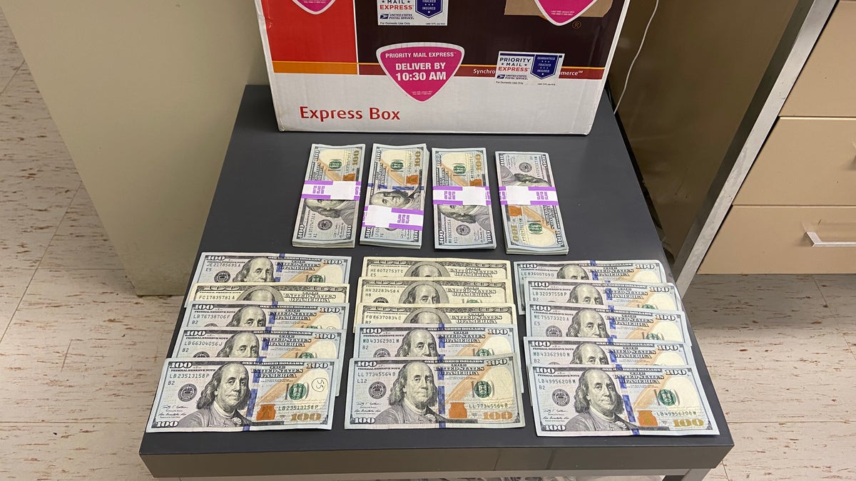 Local detectives sought help from the New York office of the United States Postal Inspection Service, where officials reached out to their counterparts in St. Louis in time to intercept the package on April 14, before it was delivered to the scammer. (Courtesy of the Suffolk County Police Department)