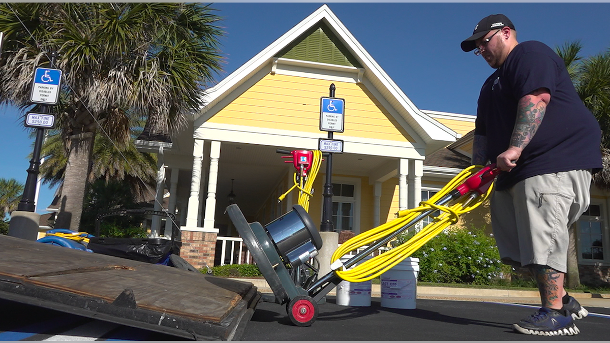 A cleaning crew member prepares to sanitize the inside of one of the recreation centers located at The Villages (Robert Sherman, Fox News).