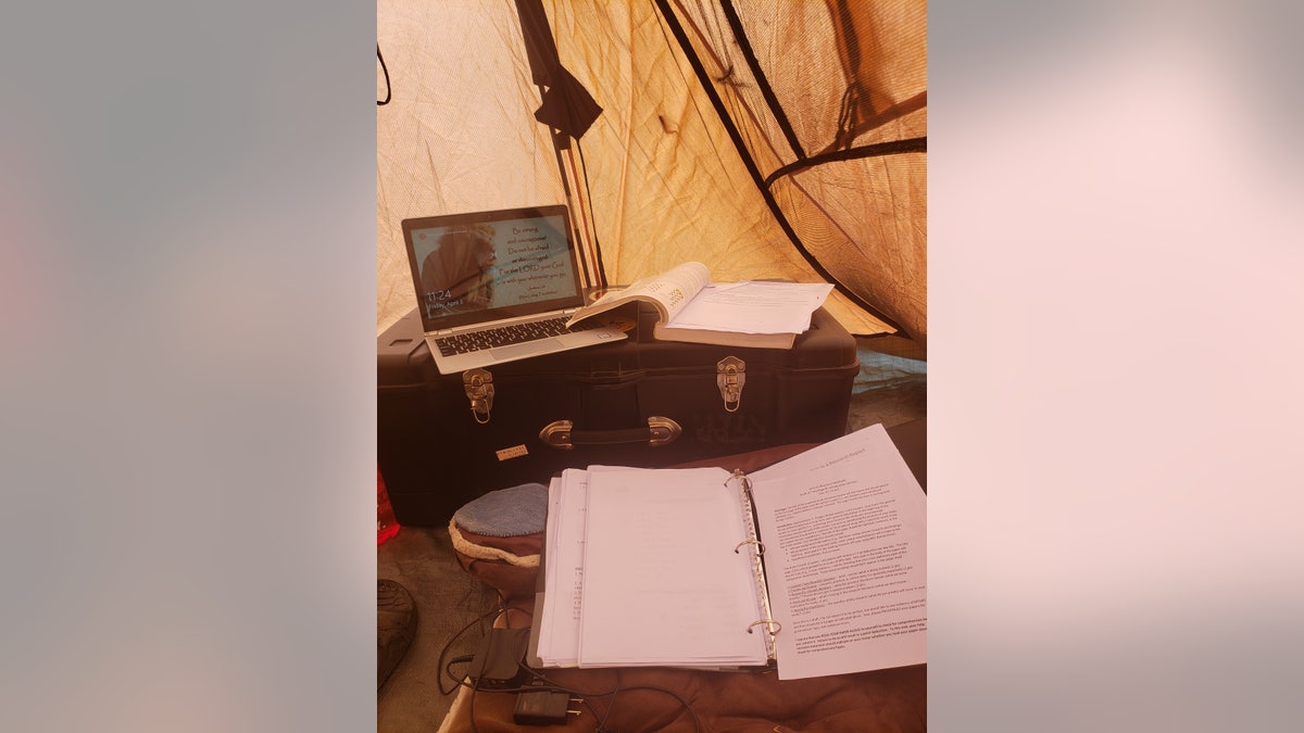 Inside Cadet William Taylor's tent where he is completing his college semester after the coronavirus pandemic.