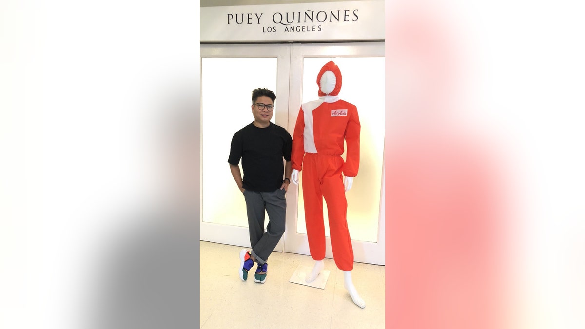 The uniforms were designed as part of a collaboration with Filipino fashion designer Puey Quiñones.
