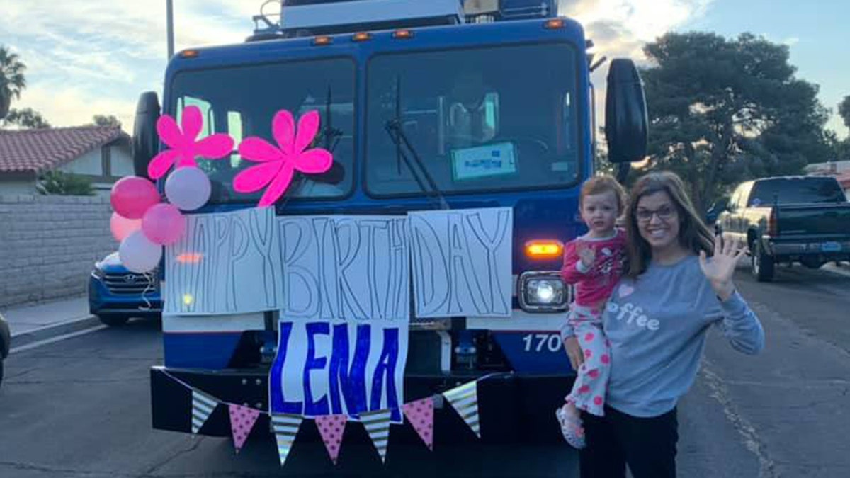 Leslie Riley’s daughter Lena recently turned three, and the birthday girl was saluted by seven trash trucks with a celebratory drive-by on April 18.