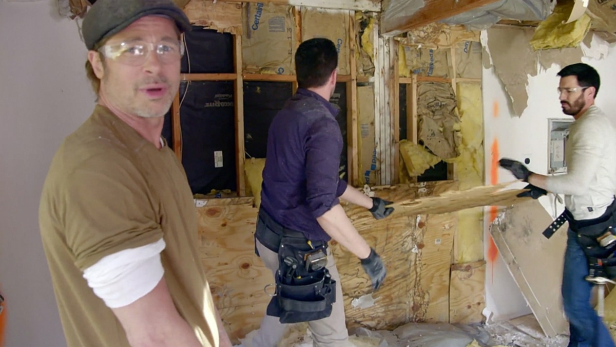 Brad Pitt appears shocked as "Property Brothers" stars Jonathan and Drew Scott demolish his makeup artist's former digs.