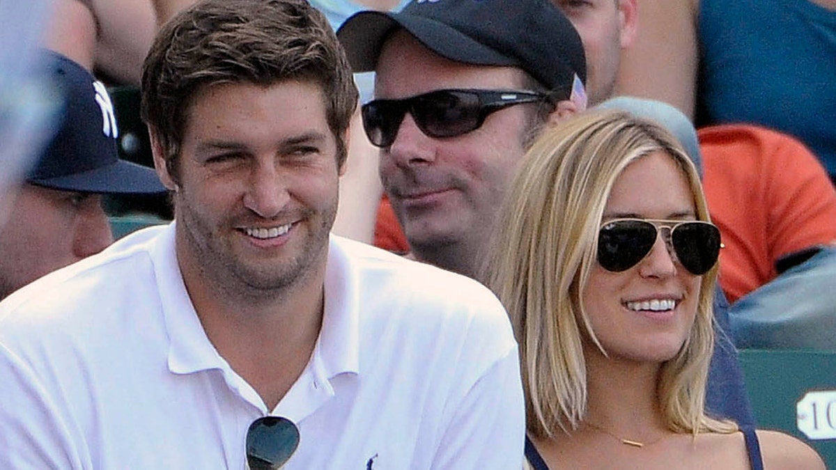 In this July 2, 2011, file photo, Chicago Bears quarterback Jay Cutler, left, and his wife Kristin Cavallari watch the Chicago Cubs play the Chicago White Sox during an interleague baseball game in Chicago.