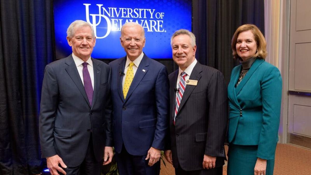 2018 photo with Joe Biden and University of Delaware officials