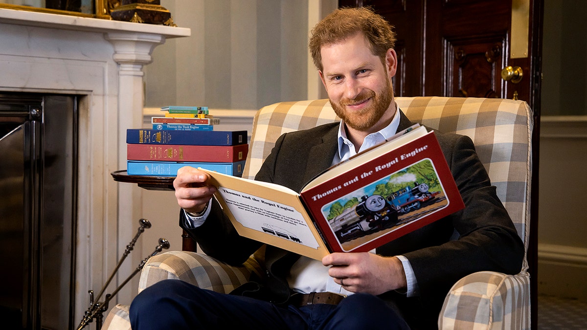 Britain's Prince Harry poses for a photo during the recording of his introduction to the new animated special 'Thomas &amp; Friends: The Royal Engine'. 
