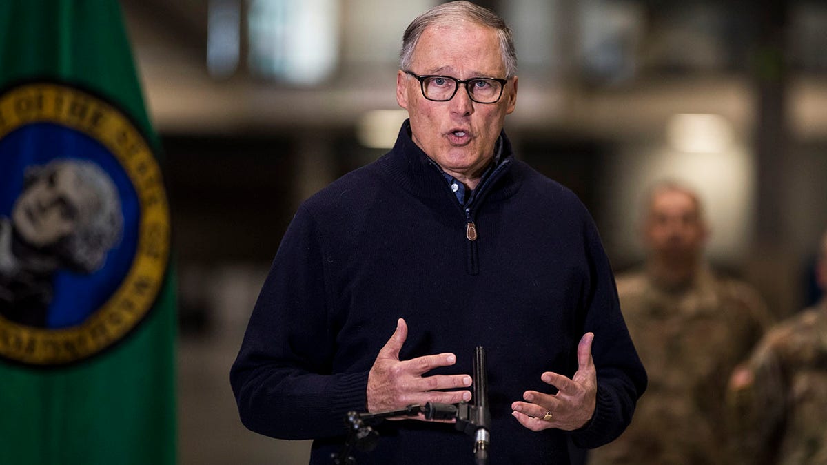 Inslee discusses the deployment of a field hospital at CenturyLink Field Event Center on March 28 in Seattle, Wash. (Amanda Snyder/The Seattle Times via AP, Pool)