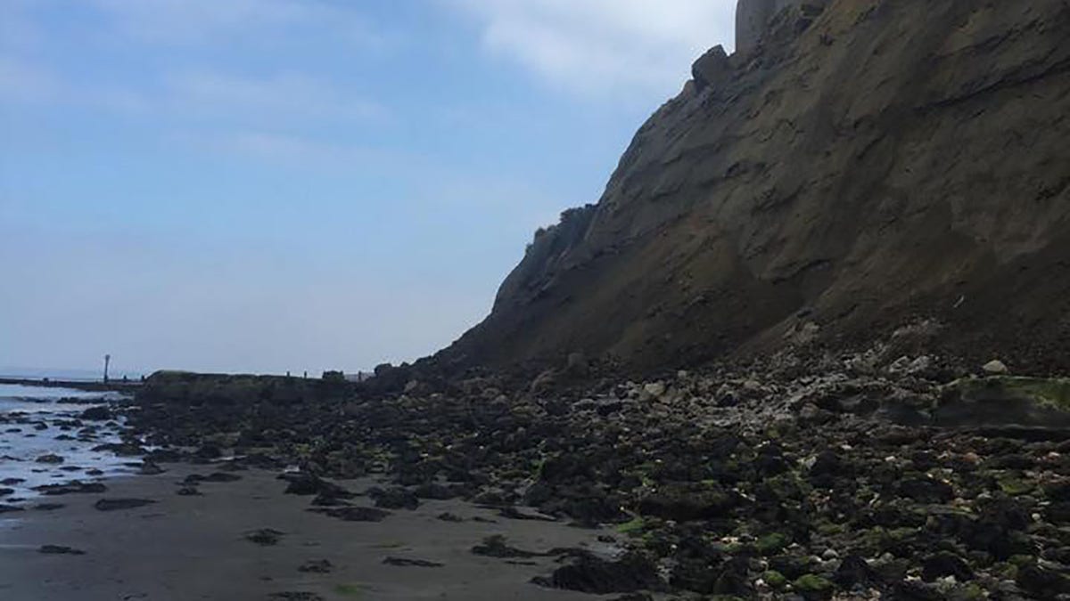 No one was injured in the rockfall, although the collapse had trapped them on the beach.