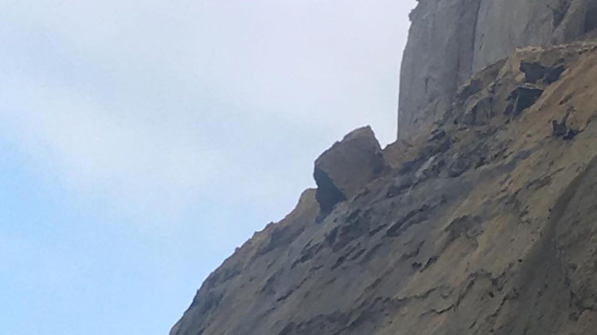 Rescuers said the cliff had collapsed in the past and urged citizens to avoid the area,