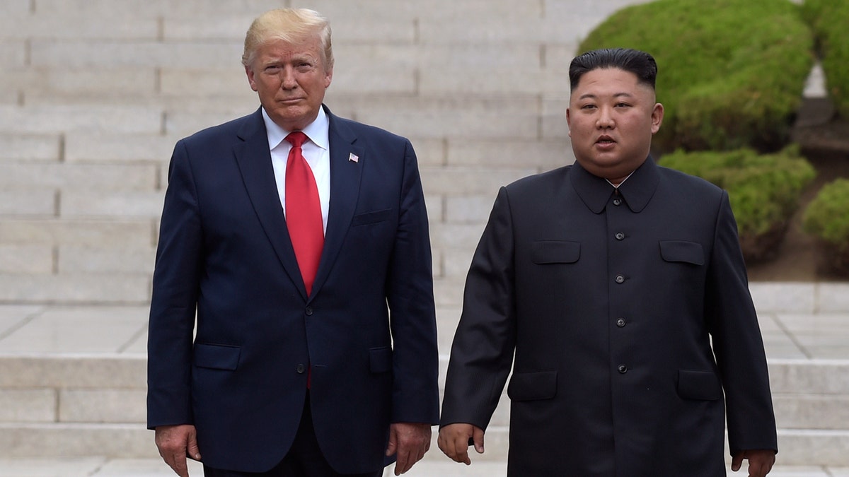 FILE- In this June 30, 2019 file photo, President Donald Trump, left, meets with North Korean leader Kim Jong Un at the North Korean side of the border at the village of Panmunjom in Demilitarized Zone. North Korea on Sunday dismissed as “ungrounded†President Donald Trump’s comment that he recently received “a nice note†from the North's leader, Kim Jong Un. (AP Photo/Susan Walsh, File)