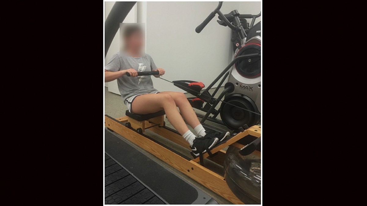 A photo released by the FBI allegedly showing one of Lori Loughlin's daughters pretending to be a rower.