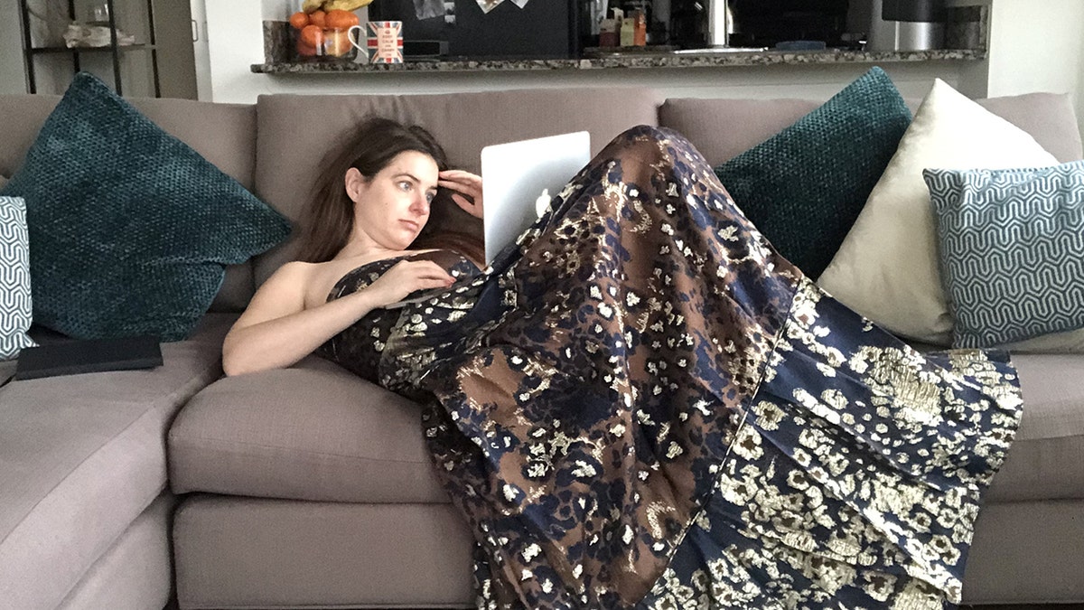 One New York woman is workin’ it while she works from home during the coronavirus pandemic, tackling each day of remote employment in a different glamorous gown.