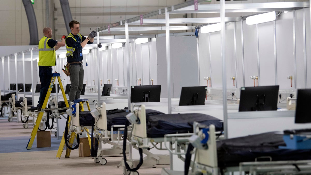 The NHS Nightingale hospital in London will eventually have enough beds to treat up to 4,000 coronavirus-positive patients. (AP)