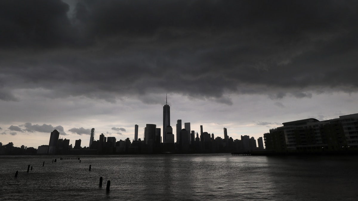 A thunderstorm passes over lower Manhattan and One World Trade Center in New York City, April 21, 2020. A "gustnado" was reported in Northern Manhattan from the storms.