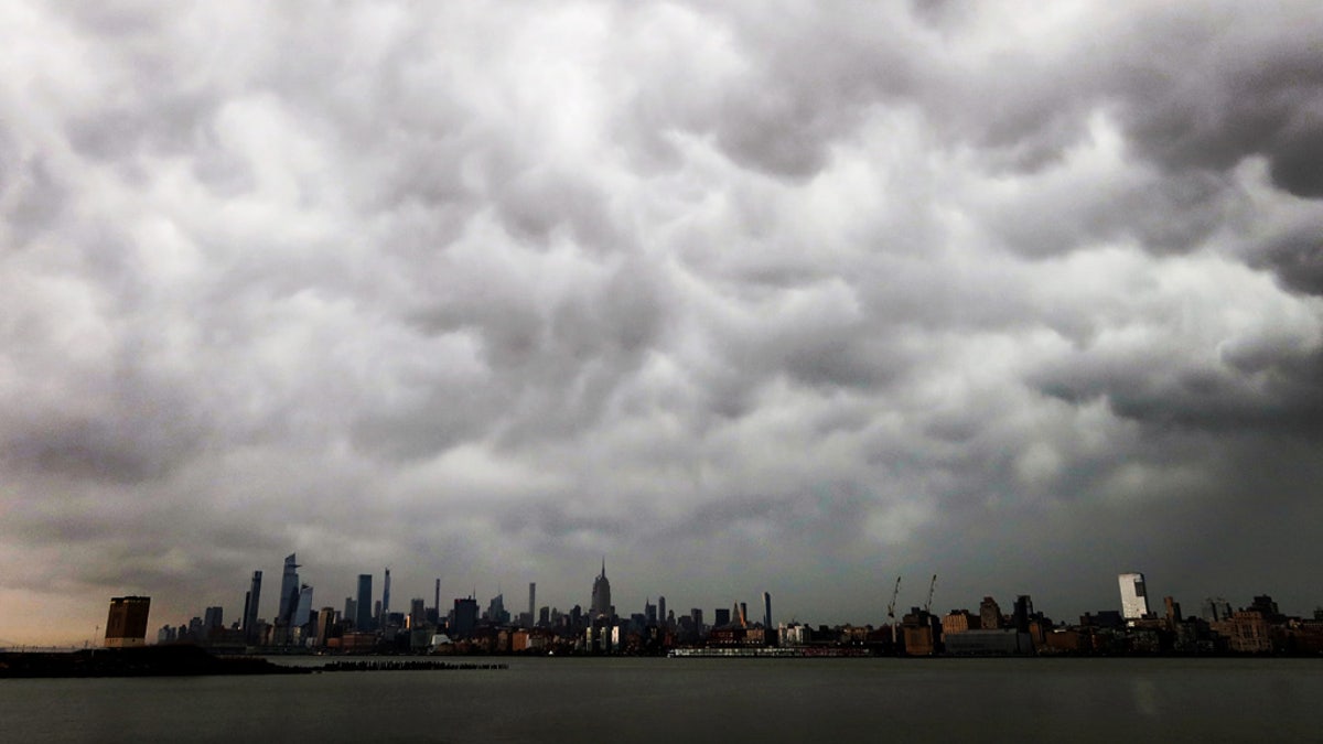 A thunderstorm passes over midtown Manhattan and the Empire State Building in New York City, April 21, 2020. A "gustnado" was reported in Northern Manhattan from the storms.