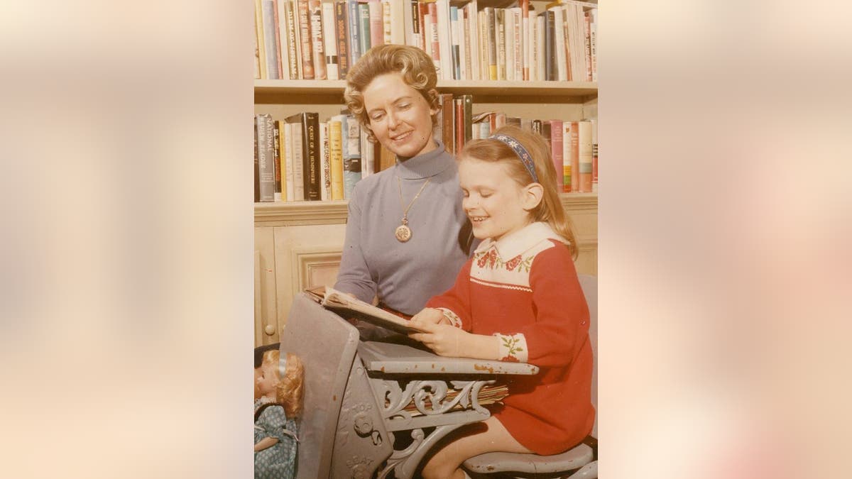 Phyllis Schlafly teaching her daughter Anne how to read in 1969.