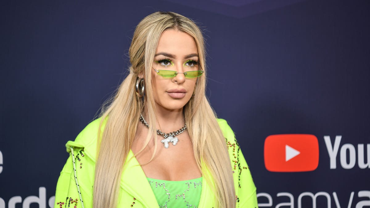 Tana Mongeau reportedly lost her verification on her YouTube channel temporarily after offering to send fans nude photos if they could provide proof that they voted for Joe Biden. It is unclear if the two events are connected. (Photo by Morgan Lieberman/FilmMagic)